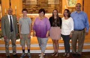 Submitted John Joyce and Lily Martin are recipients of the St. Helen School Booster Hornet Award. From left are Pat Joyce, John, Janice Fram, Lily, and T.J. and Dan Martin.