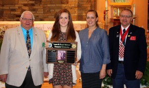 Submitted St. Helen School eighth-grader Clare Chesler is the winner of the Frank and Agnes Waltman Award, which is sponsored by the Geauga Chapter of the Knights of Columbus. From left are Ed Rowan, Clare, her mom Ann Adair and Mike Kalal.