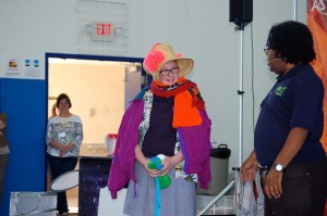 Submitted St. Mary School student Katie Suszynski wears multiple layers of clothing while participating in a science experiment run by a COSI representative during a recent visit.