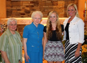 Submitted Eighth-grader Jacqueline DeRue is the winner of the Sr. Mary Harold Helms Award in honor of the first principal at St. Helen School. From left are Sr. Sandy, Sr. Jean Hoelke, Jacqueline and her mother, Lauri Pierce.