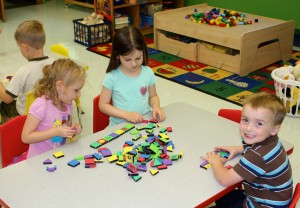 Submitted Maddy Olderman, Britten Logan and Sal Hoenigman show off their skills learning their shapes in the 4-year-old preschool class at St. Helen School.
