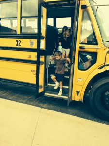 Submitted St. Mary kindergartners Elizabeth Mach and Joshua Alic are happy to ride the 32 bus to school.