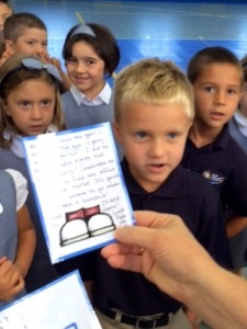 Submitted On their first day of school, St. Mary kindergartners listened carefully to a story of Pete the Cat and then searched the school for Pete using clues placed in various spots around the building. From left, Celia Duffy, Elena Ramirez, Billy Weaver and Ryan Kolcum check out a clue in the library.