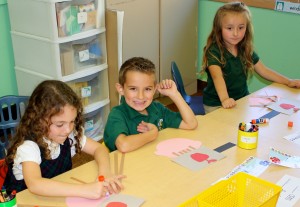 Submitted St. Helen School kindergartners (l to r) Mykaela Cox, Aaron De Mille and Gabryella Dempsey celebrated Johnny Appleseed Day by making their own Johnny Appleseeds. Other activities included making applesauce and Johnny Appleseed hats.