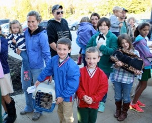 Submitted In honor of St. Francis of Assisi, St. Helen School recently had a pet blessing. Students and parishioners brought in their pets for Fr. Jay to bless, including the Nedved family with (l to r) Maggie, Mrs. Maureen Nedved, second-grader Luke, kindergartner Kyle and Sammy the cat.