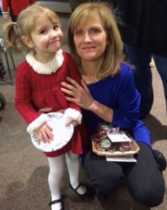 Submitted St. Helen 3-year-old preschooler Gabriella Palmer visits with her teacher Joanna Fear after performing in her Christmas program.