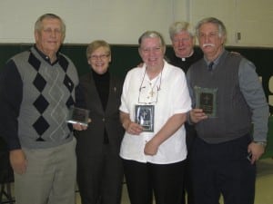 Submitted St. Helen School celebrated its first alumni homecoming honoring the class of 1965. From left are members of the first graduating class: James Koster; Sr. Margaret Hartman, principal; Sr. Barbara Soplata; Father Jay McPhillips, pastor; and Stephen Kitko.
