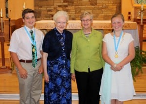 Submitted John Ricci and Margaret Murray, recent graduates of St. Helen School, were the proud recipients of the Sisters of Notre Dame Distinguished Graduate Award. With John and Margaret are Sr. Mary Jean Hoelke, SND and Sr. Margaret Hartman, SND.