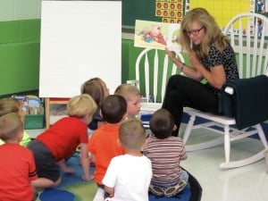 Submitted St. Helen Preschool Director Joanna Fear welcomes back her students by reading them “I Love You All Day Long,” a comforting tale of how a parent's love stays with a child whether they are together or apart - all day long.