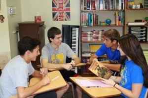 Submitted All of the students and faculty members took a one-hour break from the regular school day Friday for small-group discussions of their summer reading selections. Sophomore Tommy Munko, left, joins juniors Brendan Hyslop, Brody Austin and Jenna Lombardo in a discussion of “The Harlem Hellfighters,” one of more than 50 different books that students could choose to read over the summer. English Department chairperson Beth Walsh-Moorman and media specialist Amy Myers coordinate NDCL's summer reading program.