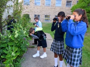 Submitted Fifth-graders (back to front) Blake Reese, Michael Temesi, Helen Holley and Giavonna O’Brien explore the NDES campus using binoculars.