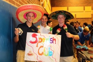 Submitted NDCL students showcase a myriad clubs - a fun way to build interest and membership. Juniors Daniel Zucker, Edward Zucker and Austin Craver represent Spanish Club.