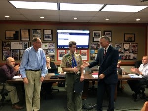 Submitted Chardon High School senior Erick Jones was honored with a Chardon Board of Education resolution for attaining the prestigious rank Eagle Scout. Superintendent Michael Hanlon congratulates Erick, who is a member of local Boy Scout Troop 91, while board President Guy Wison looks on.