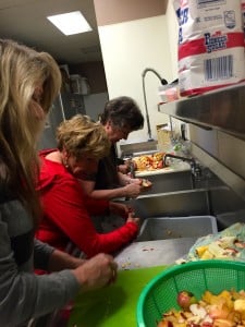 Submitted Volunteers peel apples for the pies the fifth-grade class is baking for the St. Mary Community Supper.