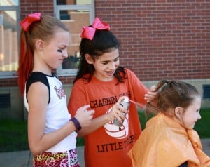 On Oct. 7 prior to the homecoming game, school families enjoyed the PTO Middle School's annual fundraiser and ice cream social in the Chagrin Falls Middle School cafeteria. There was pizza, ice cream, DJ music, a photo booth, visit with Mortimer, face and hair painting and a healthy dose of team spirit.