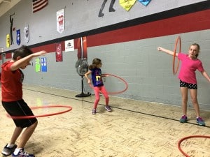 Submitted Fourth-graders hula hoop during exercise club before school starts at Jordak elementary and Cardinal intermediate schools. Gym teacher Sara Brodnan implemented the club as a way to help students have a more productive day in the classroom.
