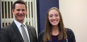 Submitted WG Principal Jay Bishop congratulates student and Girl Scout Deanna Swinerton for helping create the high school cross country course as part of her Gold Award.