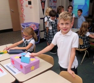 Submitted NDES second-grader Paul Williams, of Auburn Township, casts his vote for president in social studies class.