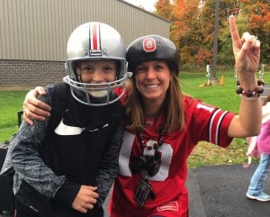 Submitted Newbury Elementary School Principal Mandy Randles and a student show their support for their favorite sports teams during Spirit Week.
