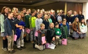 Submitted St. Mary School students in grades six through eight meet with Holocaust survivor George Kronenberg at the Face to Face Holocaust education program in Beachwood.
