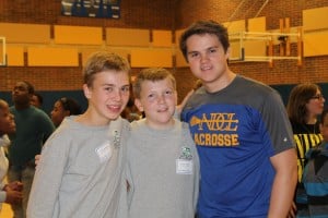 Submitted Communion of Saints students Jack Slemenda and Bailey Fischer spend the day with NDCL senior Ryan MacDonald during Lion Encounter.