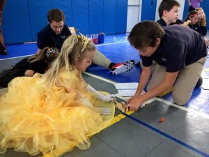 Submitted Princesses can build catapults, too. Avery Neill works with Max Buzogany to create a mini catapult during the Halloween Carnival.