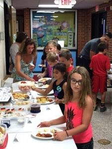 Submitted Munson third-graders recently learned about different cultures by tasting foods from around the world. Parents brought in dishes representative of their family’s heritage and culture.
