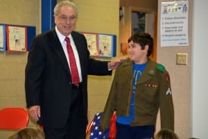 Submitted Mr. Dominic Mongiardo has his grandson Ralph Asher try on his Army jacket during the Salute to Veterans event held at Timmon’s Elementary School.