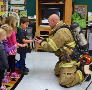 Submitted Mr. Justin Geiss, father of first-grader Piper and preschooler Hudson, reviews fire safety rules with preschoolers (l to r) Jimmy Adair of Bainbridge, Kenzie Keyser of Chardon, Demi Pirichy of Burton and Harper Hoar of Burton. Students were also able to go outside to see one of the Chardon fire trucks.