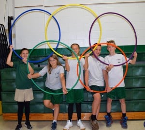Submitted St. Helen students (l to r) Molly Lee, Mary Adamic, Audry Joyce, Isaac Williford and Anthony Ledbetter participate in Olympic game competition during physical education class.
