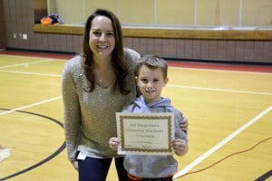 Submitted East Geauga Kiwanis Club recently gave recognition to Ledgemont Elementary School third-grader Jacob Patterson for being an outstanding student as chosen by his teacher. He received a certificate and four literature books. With Jacob is Principal Kelly Timmons.