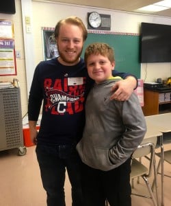 Submitted Singer/songwriter Brett Fromson recently spoke with the seventh-grade English class. He is pictured with seventh-grader Teddy Yuhasz.
