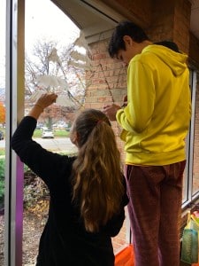 Submitted A group of Chardon Middle School art students recently shared their talents by painting cheery winter scenes on several windows around Chardon Square, including at the Chardon Public Library.